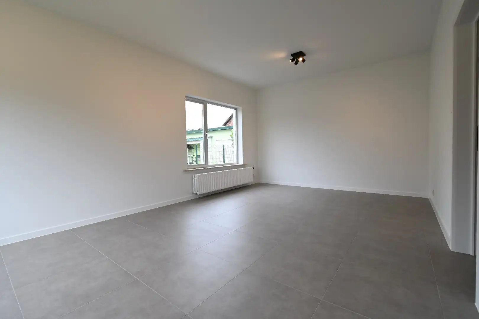 Zorgvuldig gerenoveerde vrijstaande woning met veranda en leuke tuin op 5a24ca te Munsterbilzen foto 7