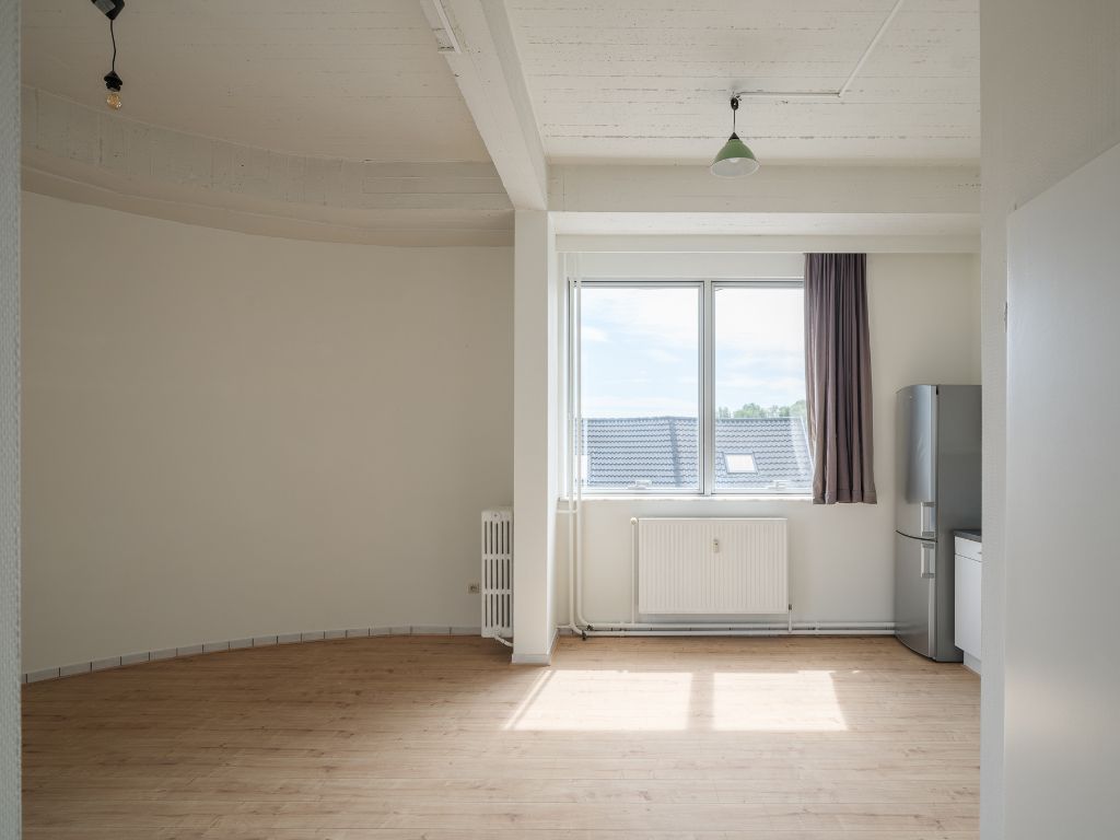 Unieke, lichtrijke cityflat nabij de Coupure foto 2