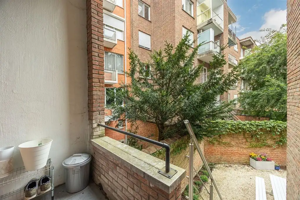 Instapklaar appartement met ruime tuin foto 10