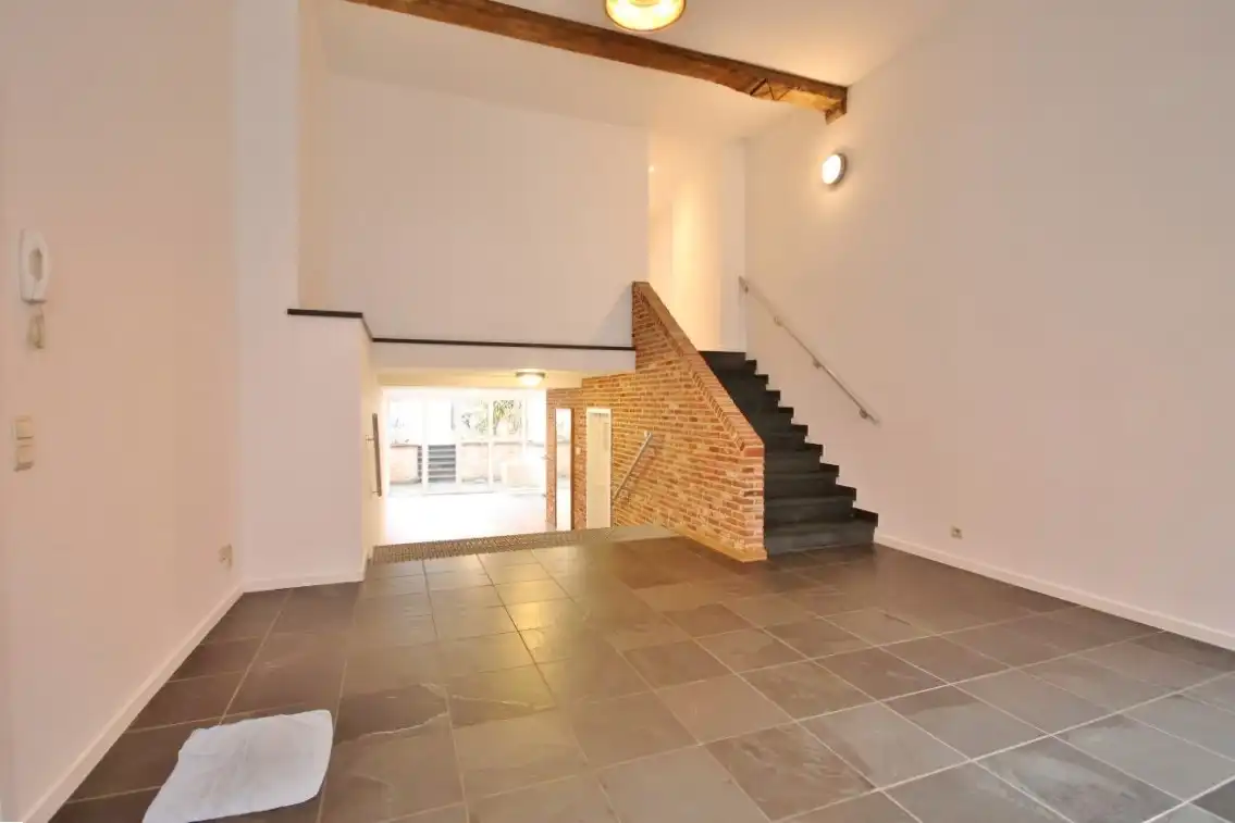 Gunstig gelegen gelijkvloers duplex appartement nabij de Grote Markt foto 3