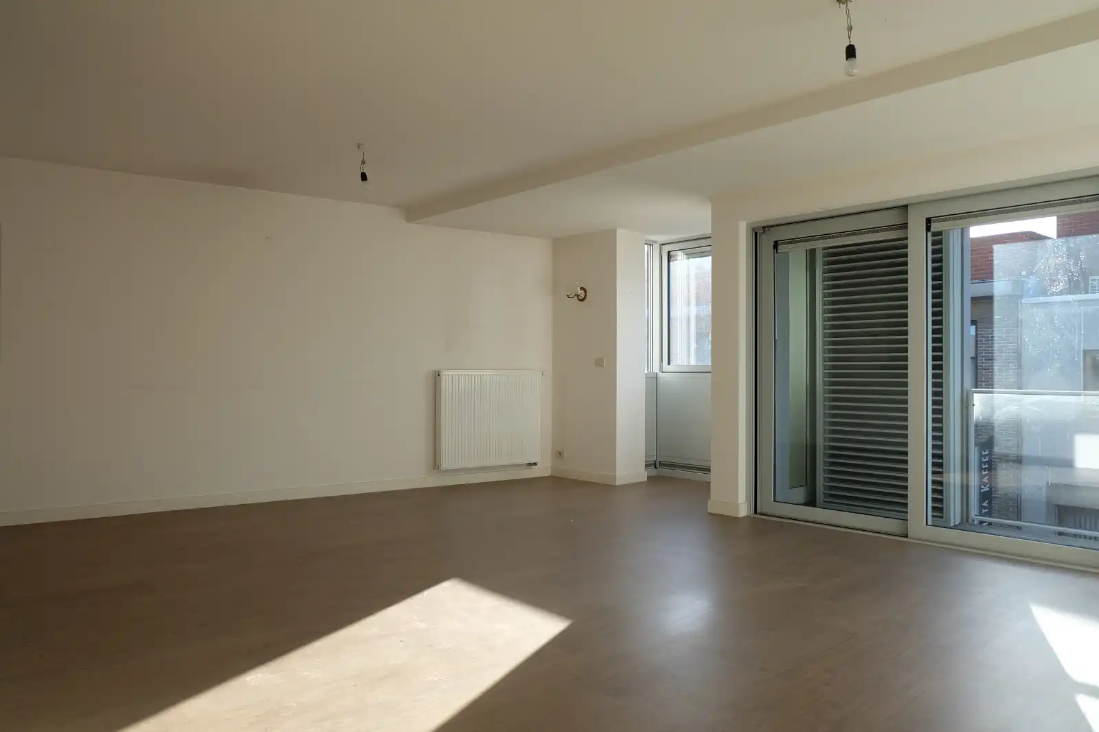 Ruim  3-slaapkamerappartement in hartje Waregem te huur foto 3