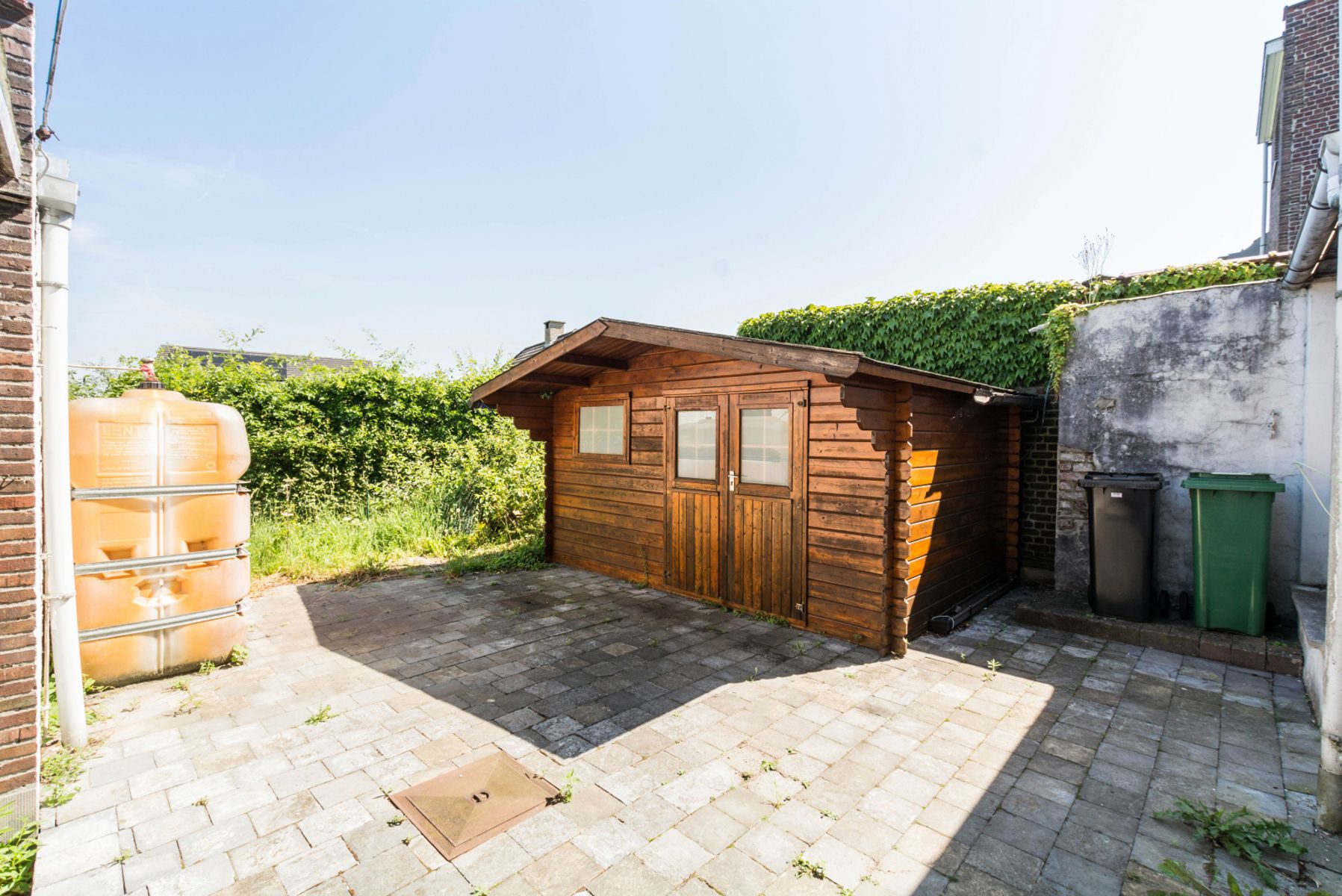 Zeer goed en mooi gelegen driegevelwoning met garage en tuin foto 6