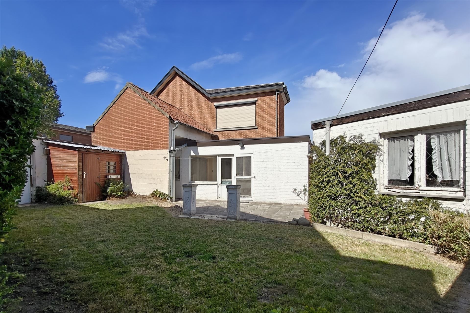 Goed onderhouden woning met 3 slpk. en 2 ingangen in Mopertingen foto 3