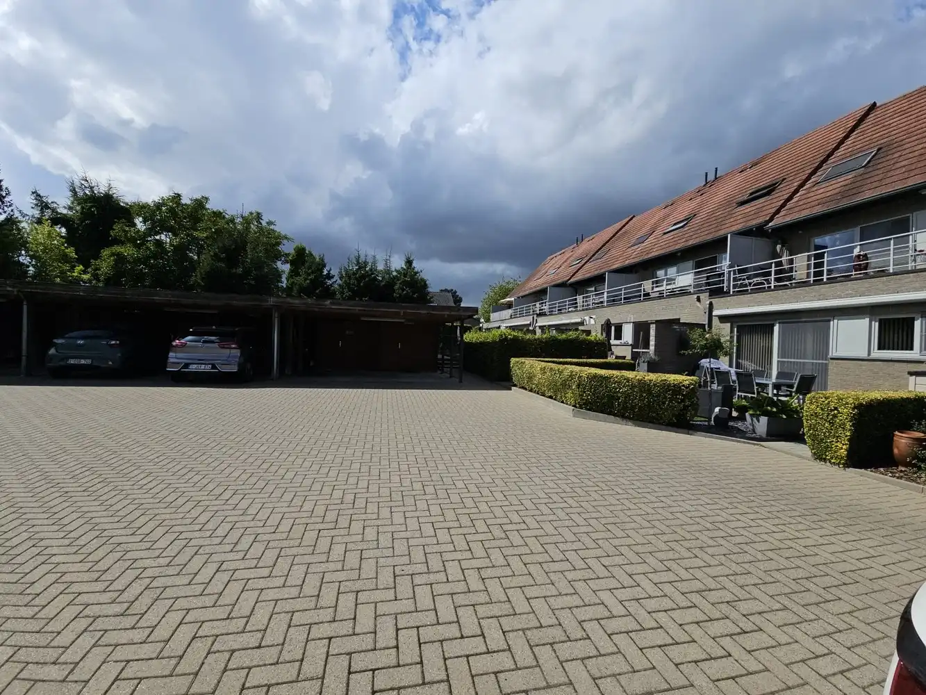 Duplex appartement met ruim terras en carport/berging foto 23
