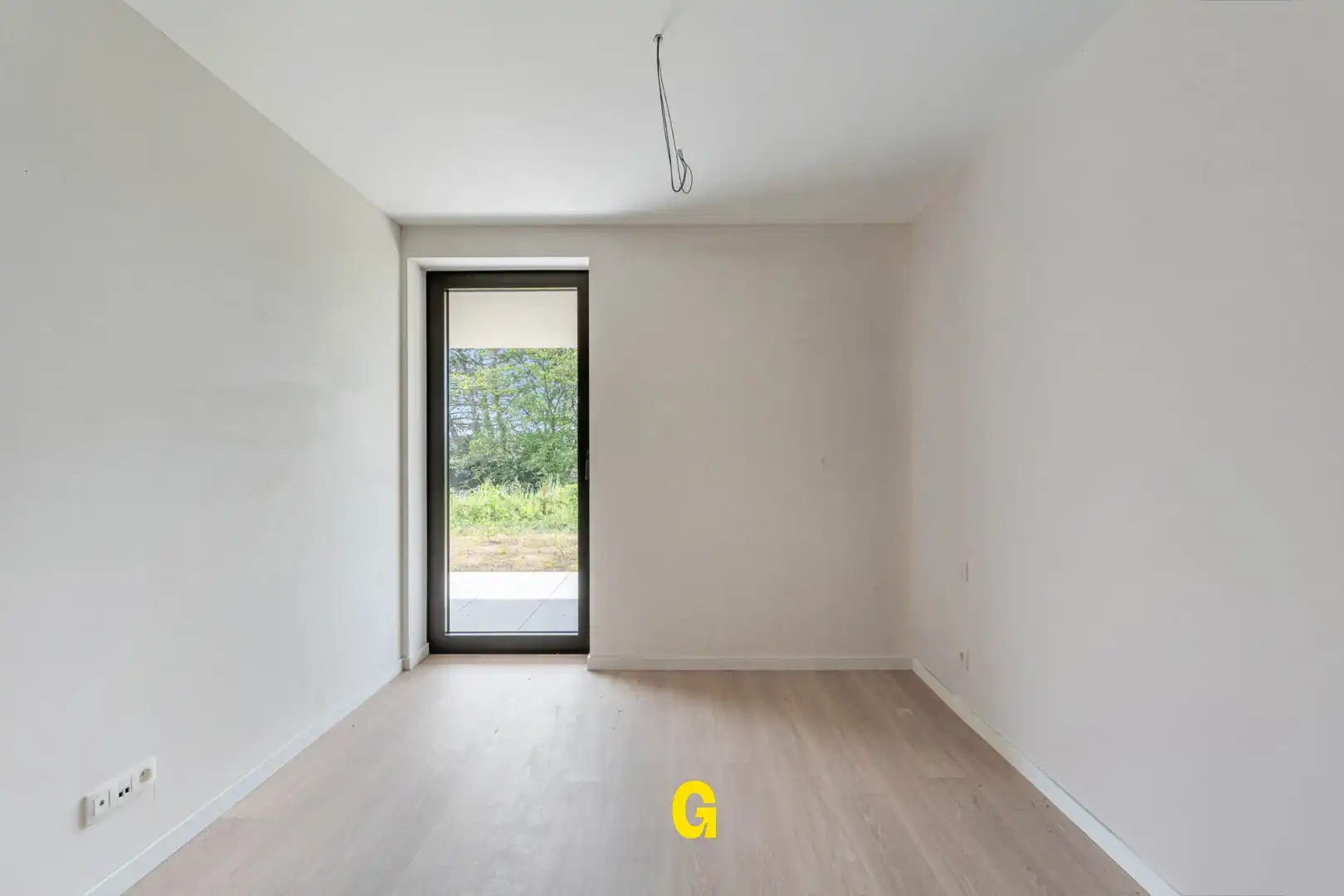 Gelijkvloers nieuwbouwappartement in residentie Bella Vista met 1 slaapkamer en terras en tuin met blijvend zicht op achterliggend groen, vlakbij het centrum.  foto 16