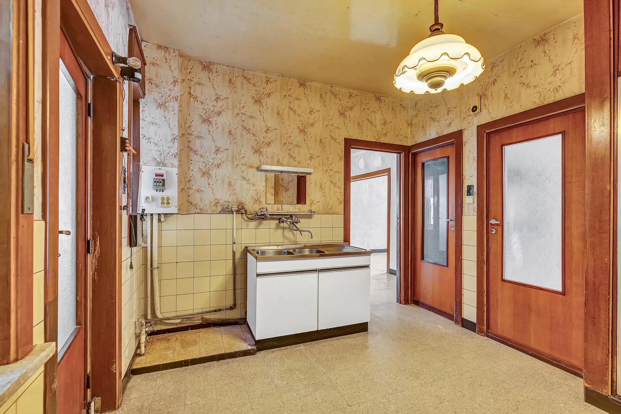 Te renoveren woning met garage foto 17