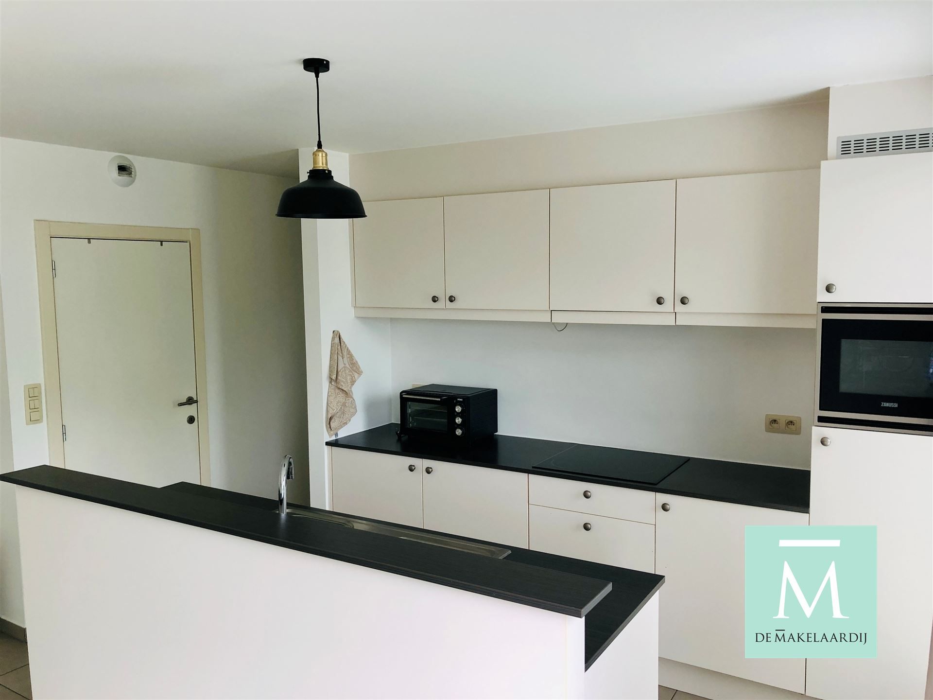 Uitstekend gelegen appartement met 2 slaapkamers in het centrum van Onze-Lieve-Vrouw-Waver foto 2