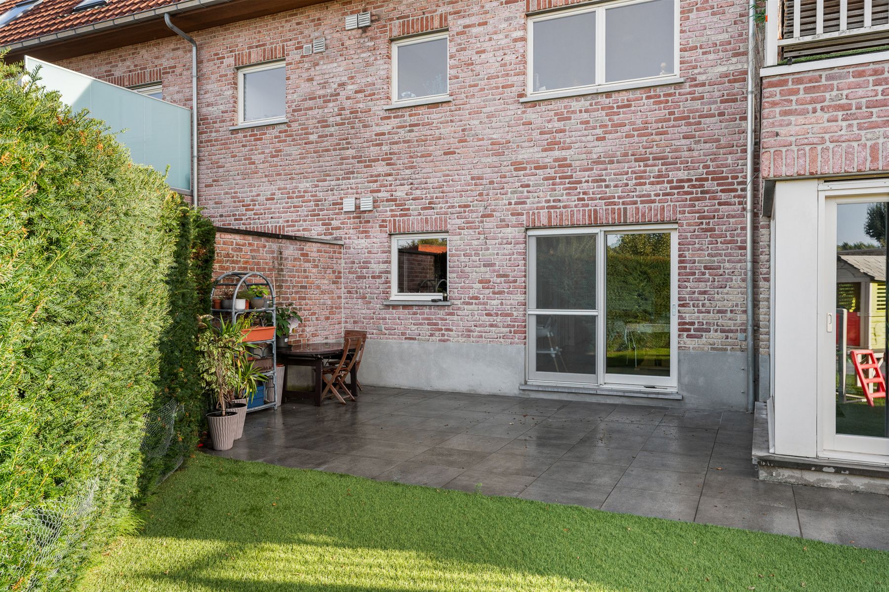 Gelijkvloers appartement met tuin en garage in Astene. foto 14