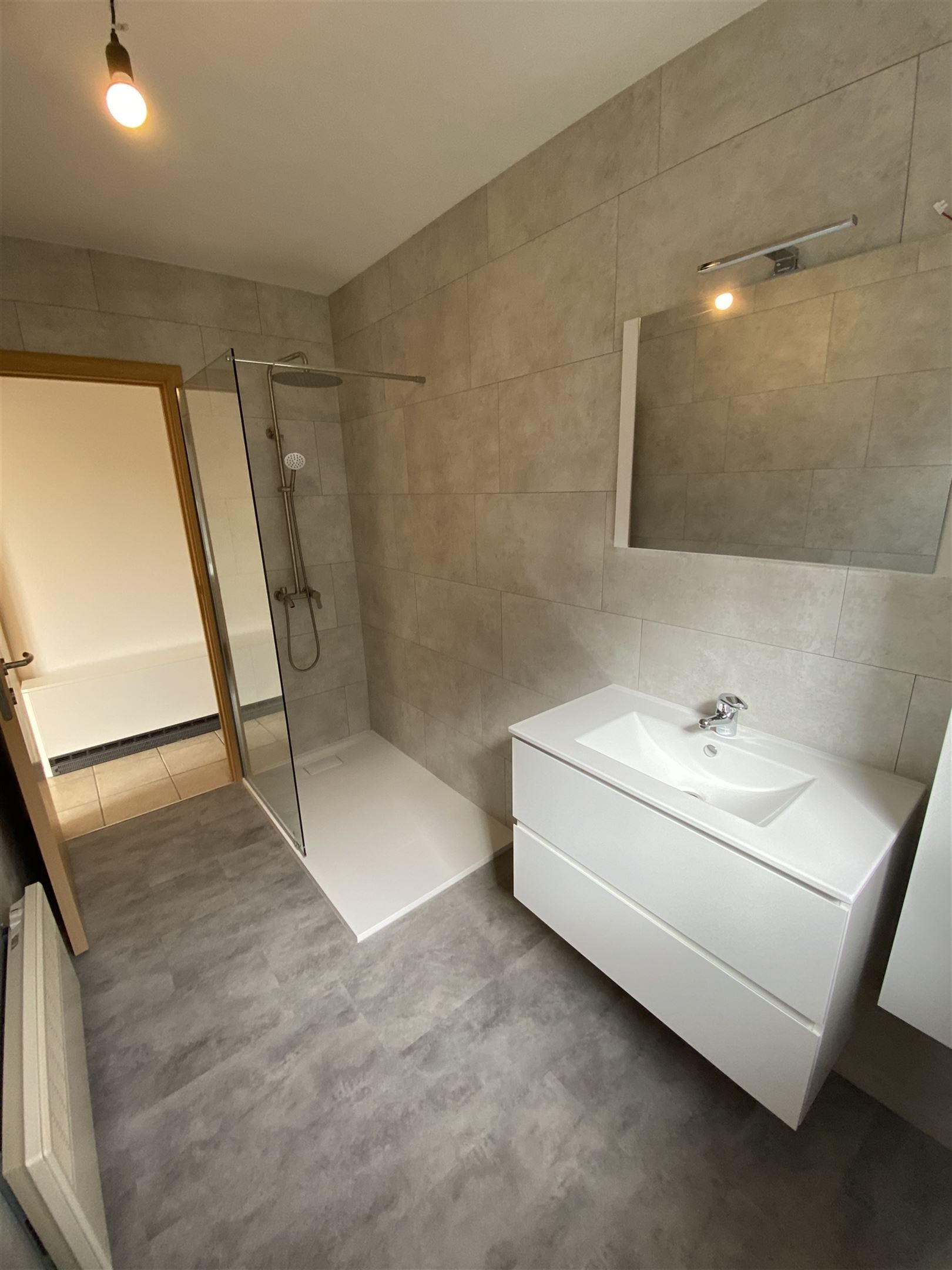 gelijkvloers appartement met garage foto 14