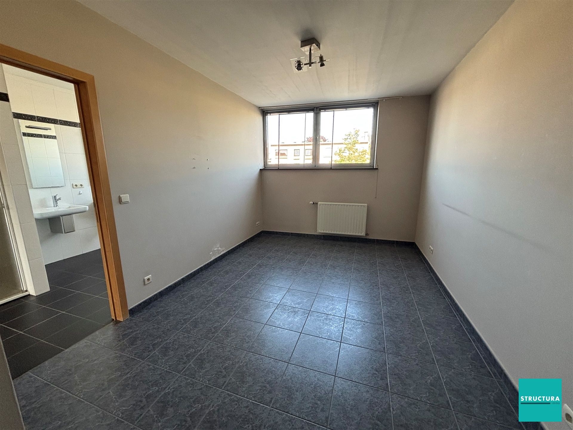 VOLZET: Appartement met 3 kamers en ruime garage in centrum Merchtem foto 15