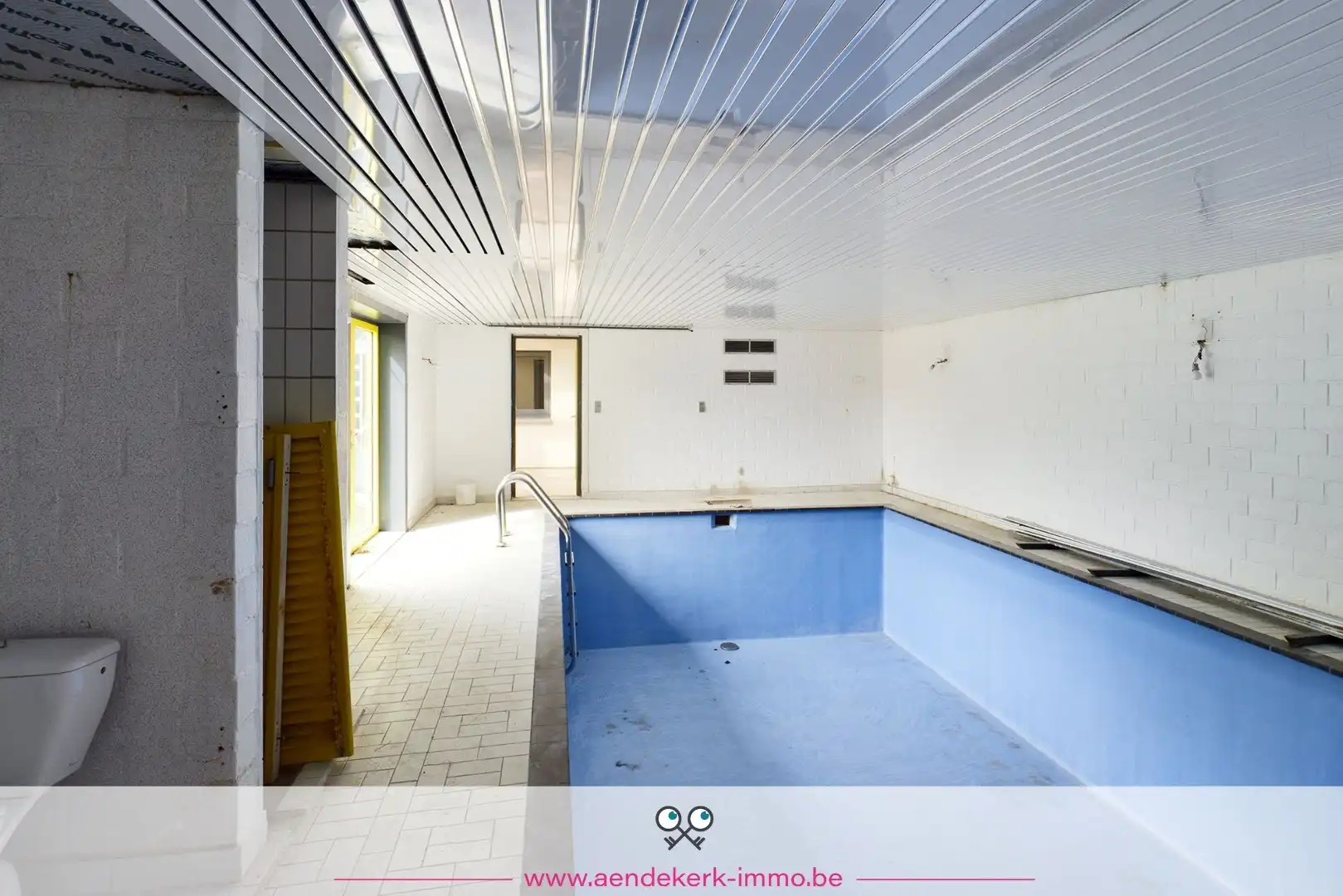 Woning met handelsruimte in het centrum van Kinrooi foto 24