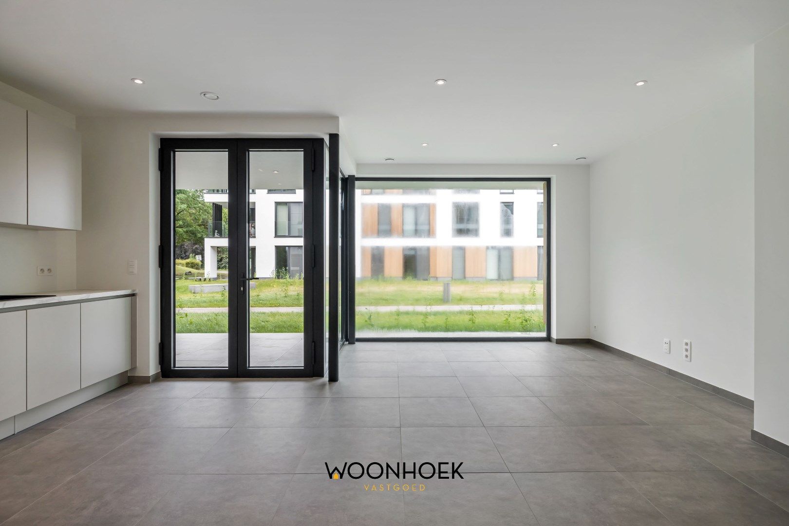 Luxueus 2-slpk nieuwbouwappartement OEVERPARK te Lokeren foto 4