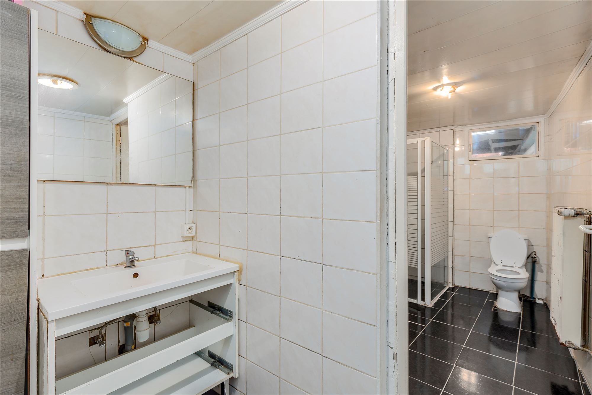 Te renoveren woning 2 slpk met garage foto 11