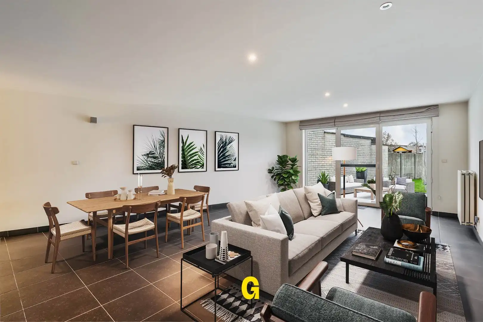 Degelijke instapklare rijwoning met drie slaapkamers, inpandige garage en tuin met terras vlakbij het centrum van Bilzen foto 3