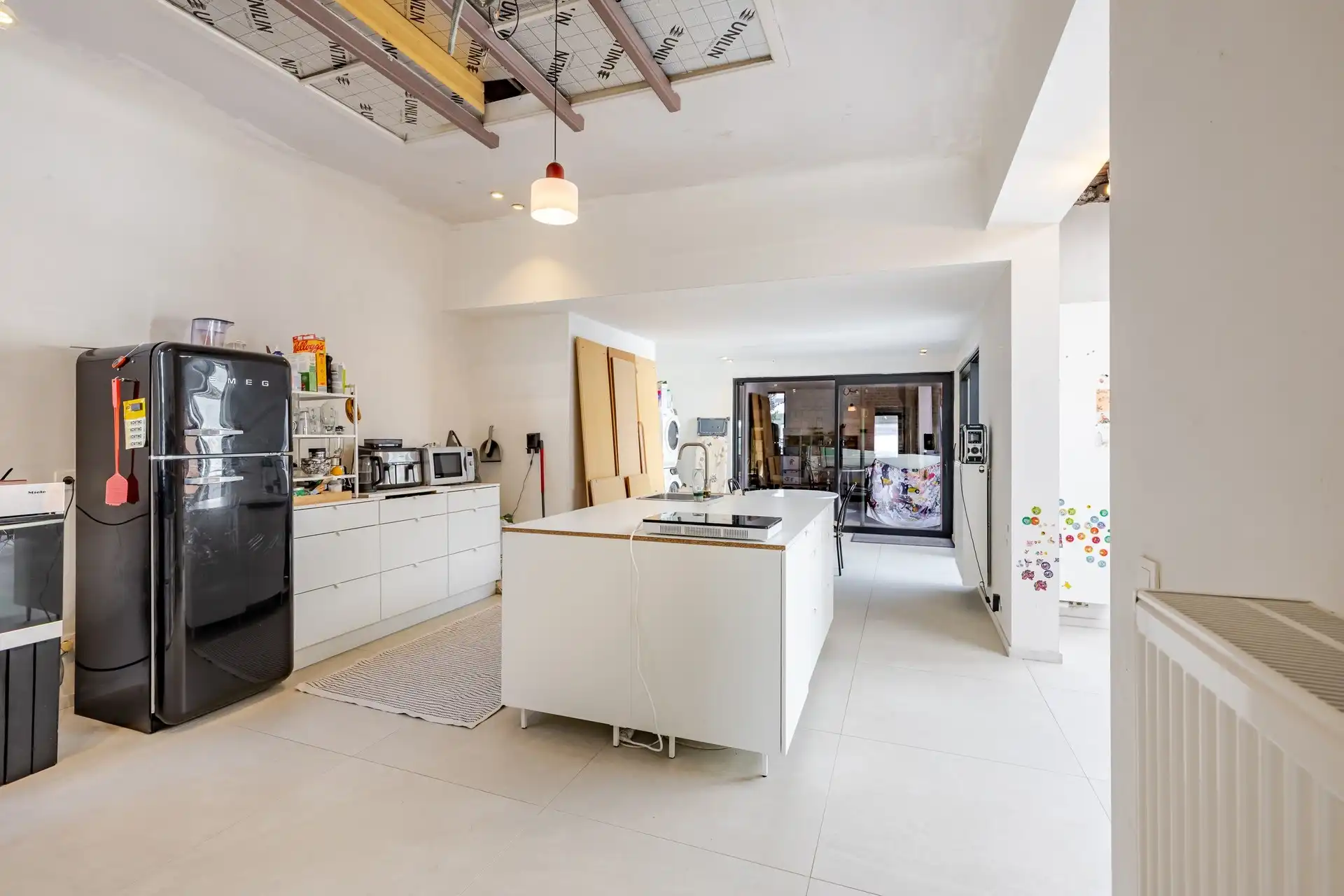Karaktervol herenhuis met art-decoallure, ruime magazijnen en zuidgerichte tuin  foto 8
