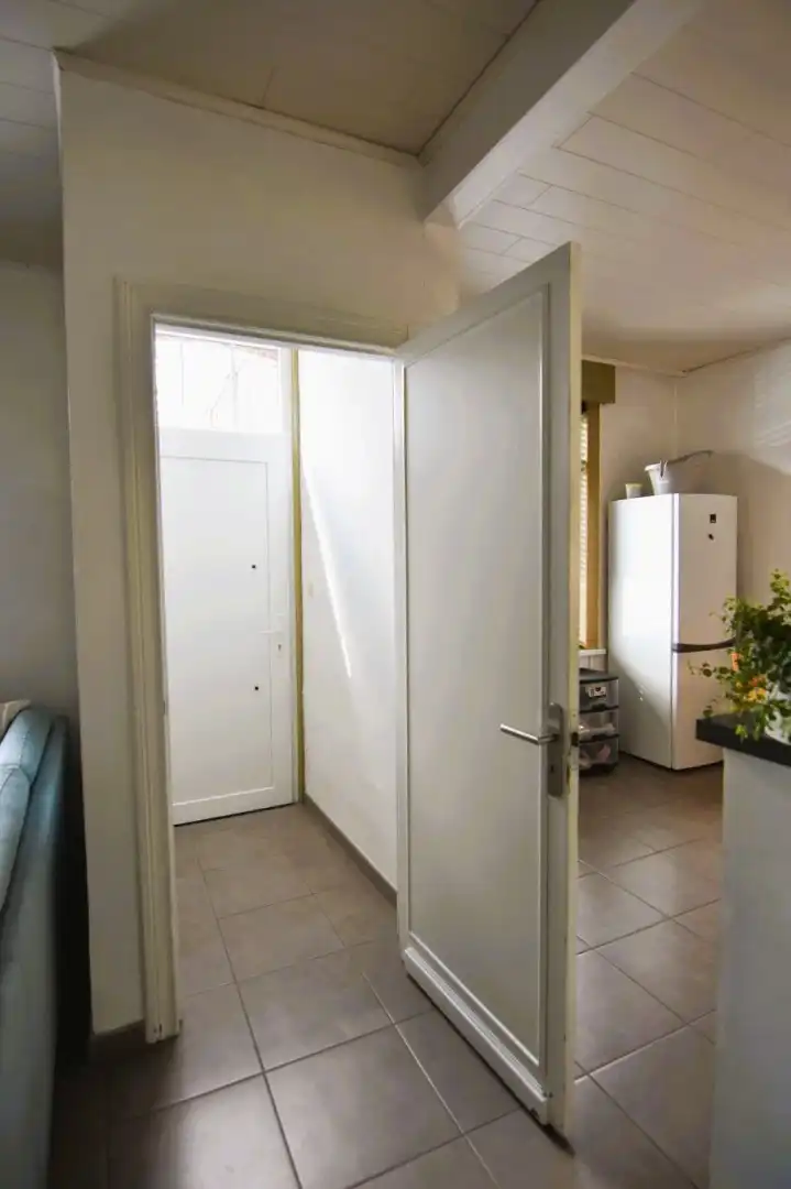 Gezellige rijwoning met diepe tuin in Moorslede foto 2