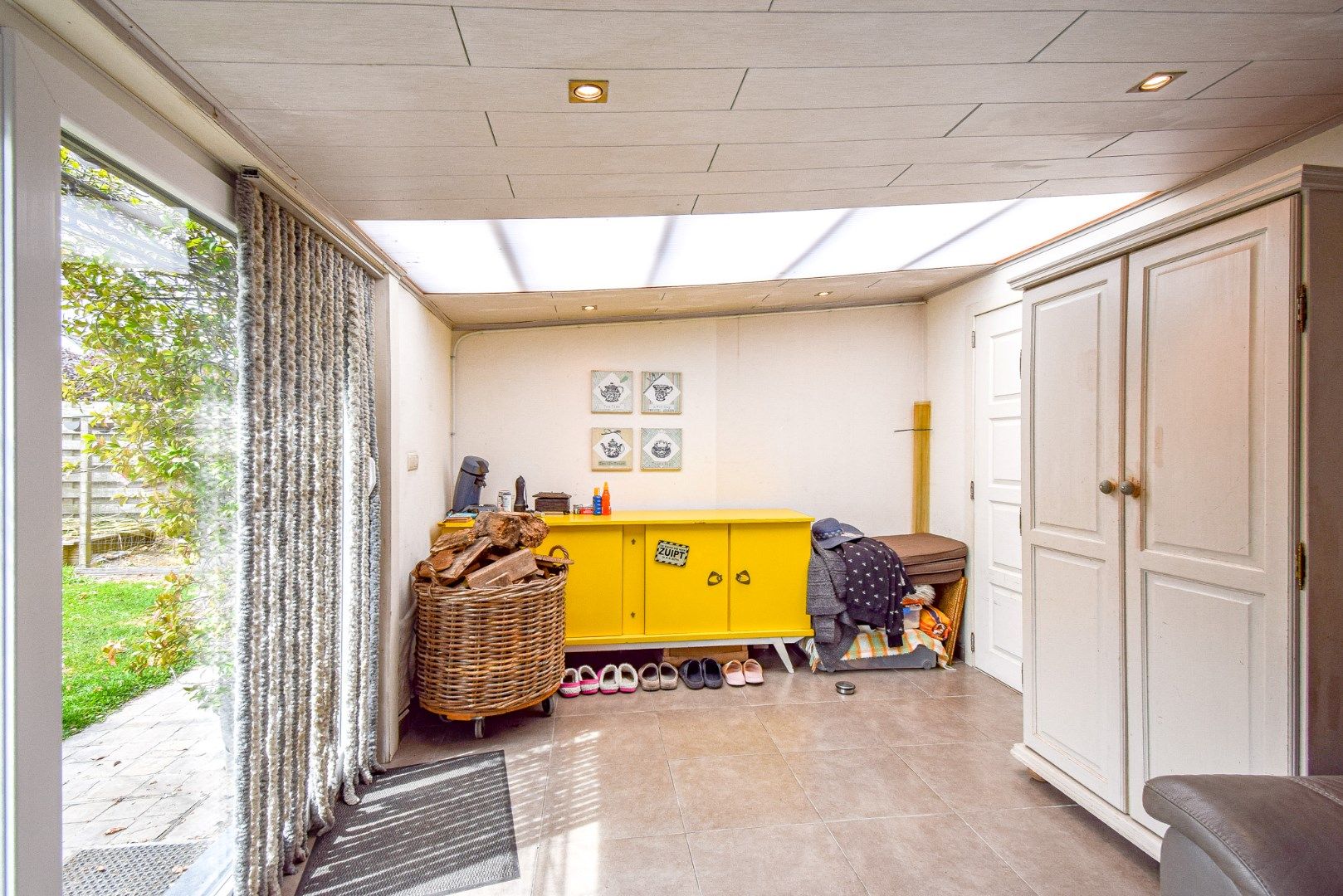 Rustig gelegen halfopen gezinswoning met ruime tuin en garage foto 21