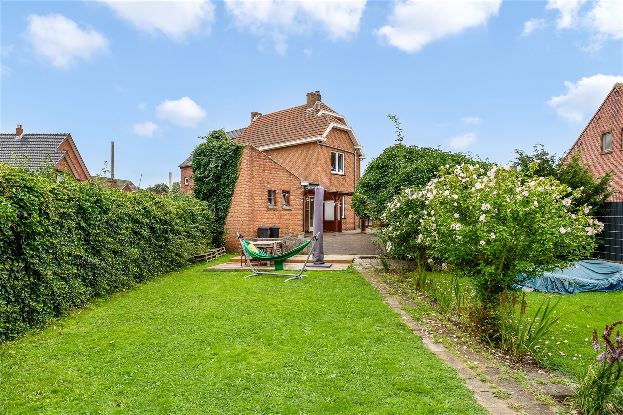 DEELS GERENOVEERDE WONING MET 4 SLAAPKAMERS OP RUIM PERCEEL VAN 6A29CA VLAK BIJ BERINGEN CENTRUM foto 15