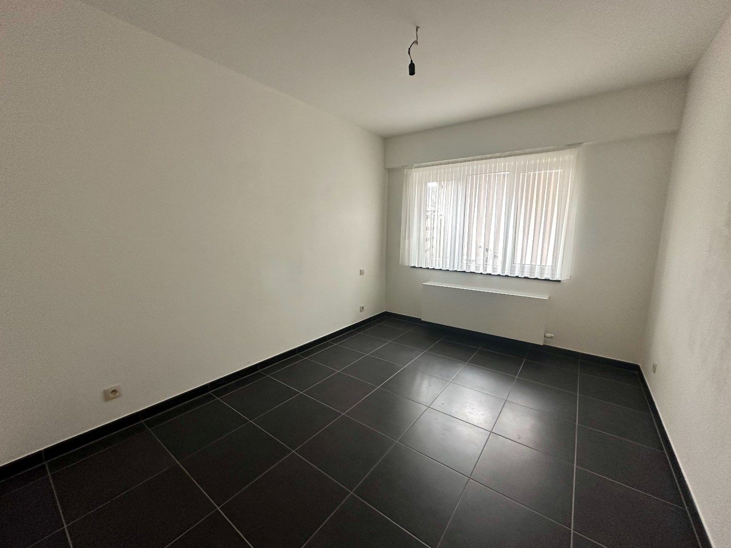 Instap klaar appartement op het gelijkvloers rechts met gezellige koer.  foto 9