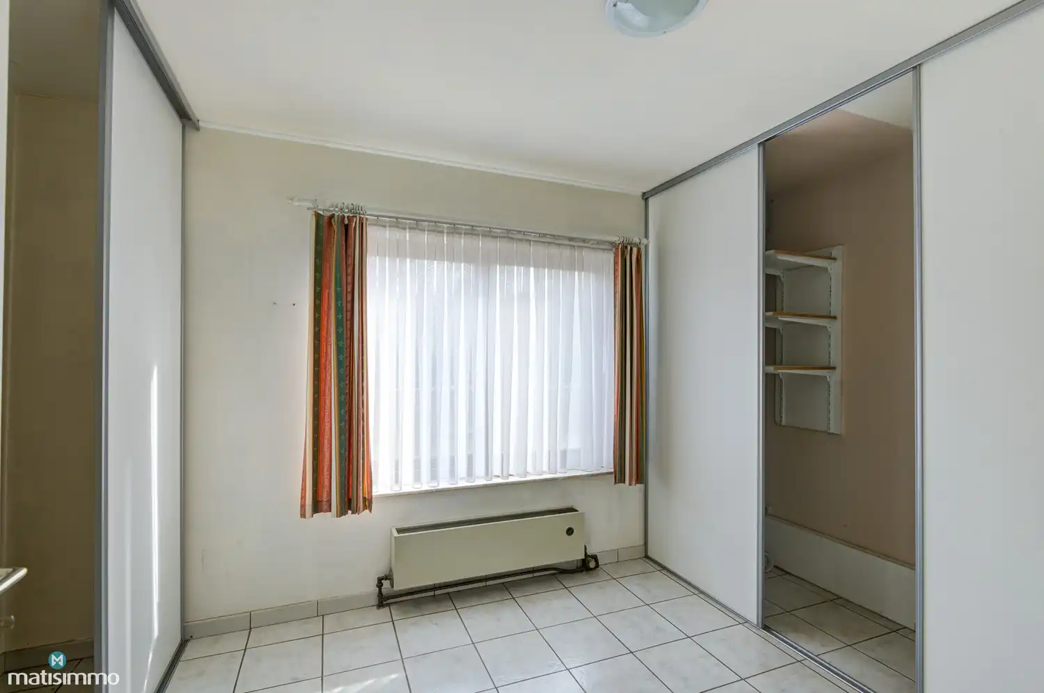 GELIJKVLOERS APPARTEMENT MET 2 SLAAPKAMERS, RUIME GARAGE, AUTOSTAANPLAATS EN KELDERBERGING TE LANAKEN foto 16