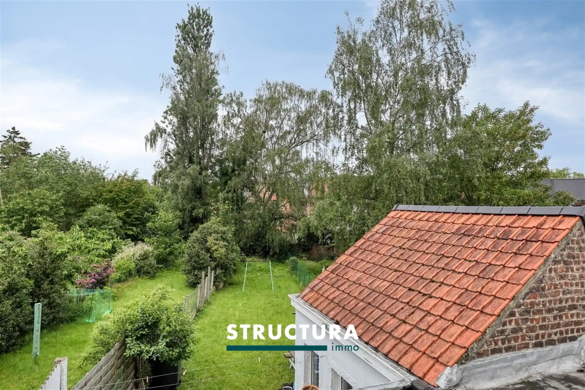 Ruime woning met tuin foto 18