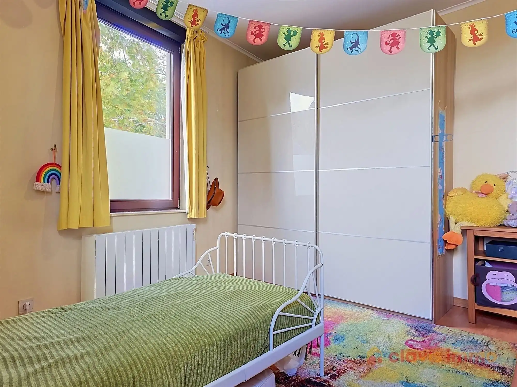 Aangename 3-gevel woning met tuin foto 18