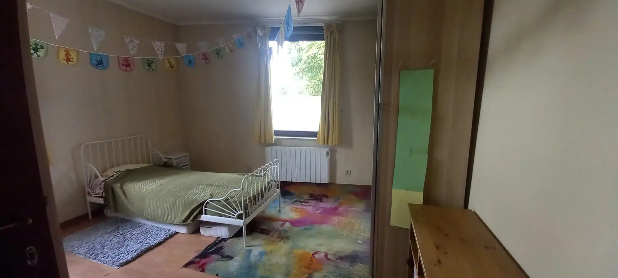 Aangename 3-gevel woning met tuin foto 18