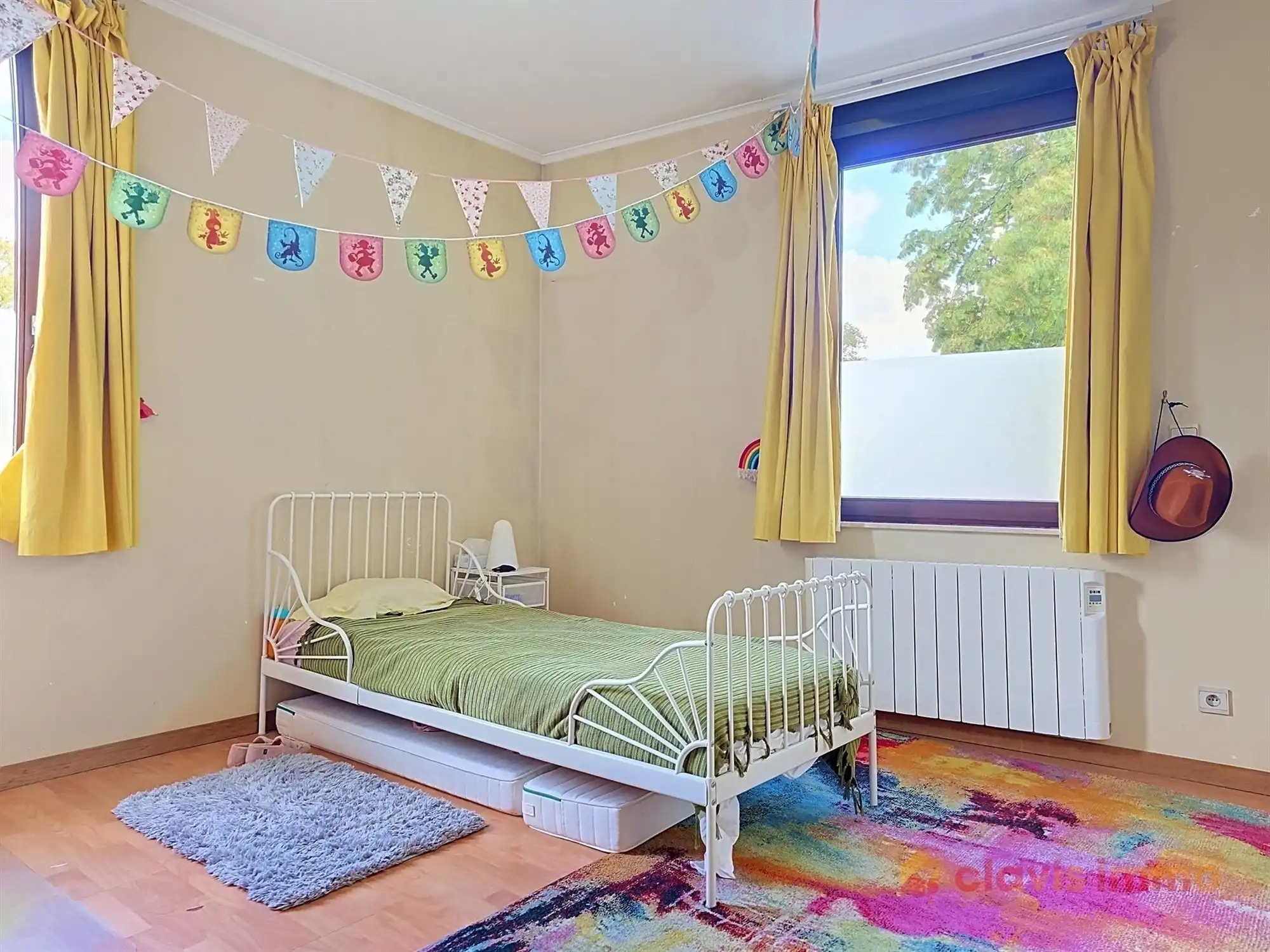 Aangename 3-gevel woning met tuin foto 18