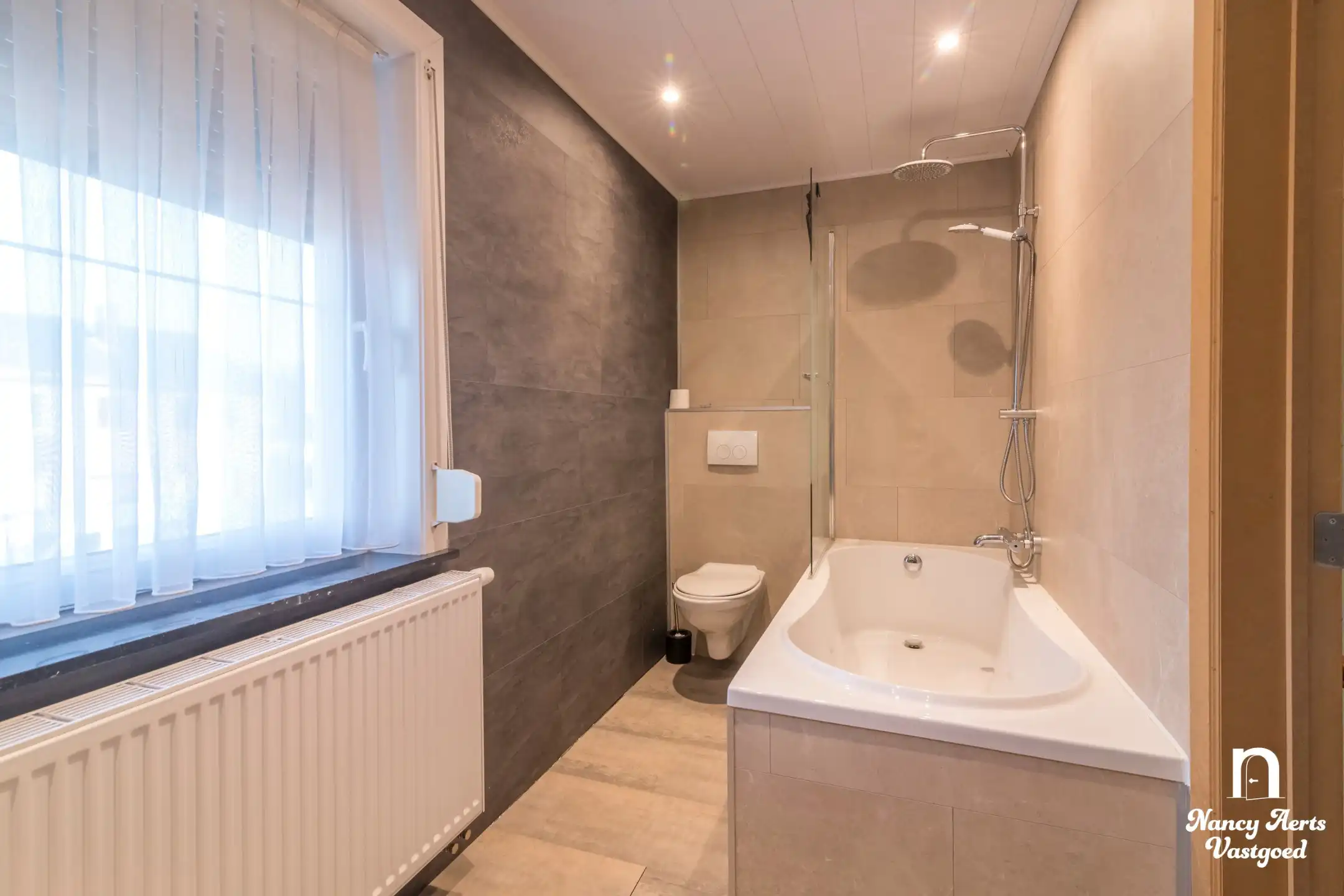 Gerenoveerde instapklare woning met zuidgerichte tuin foto 31