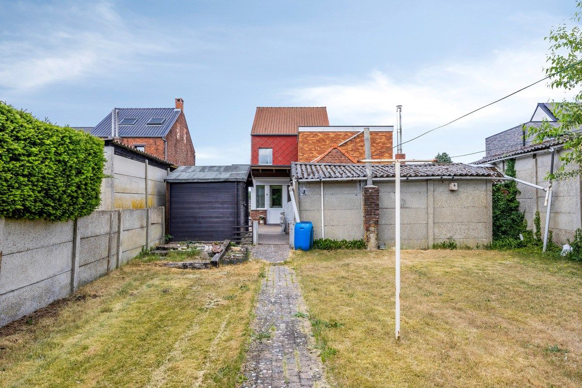 Ruim ingedeelde woning met 3slpks op een gunstige ligging. foto 27