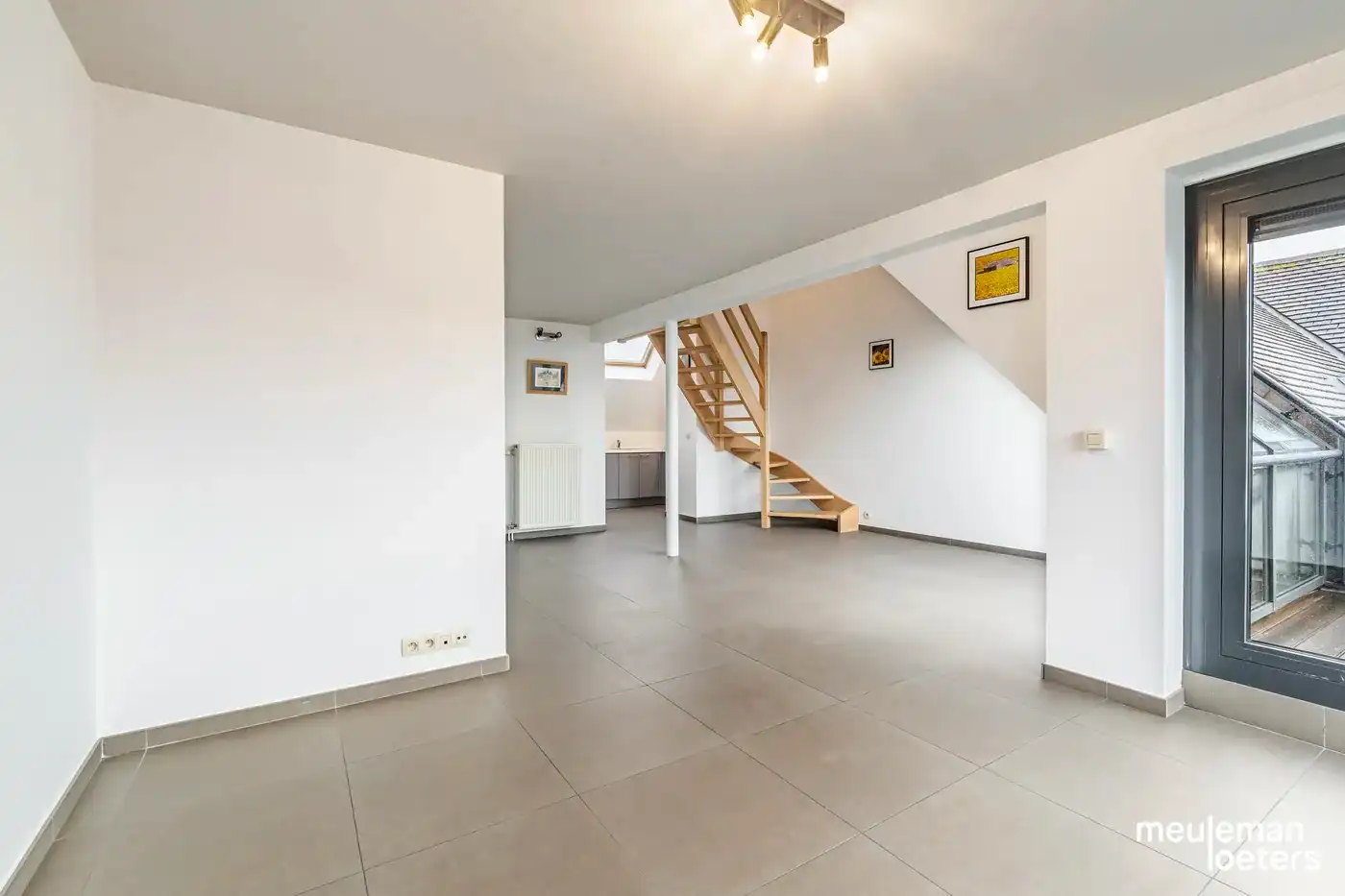 Lichtrijk en eigentijds penthouse met drie slaapkamers, twee terrassen en overdekte parkeerplaats foto 3