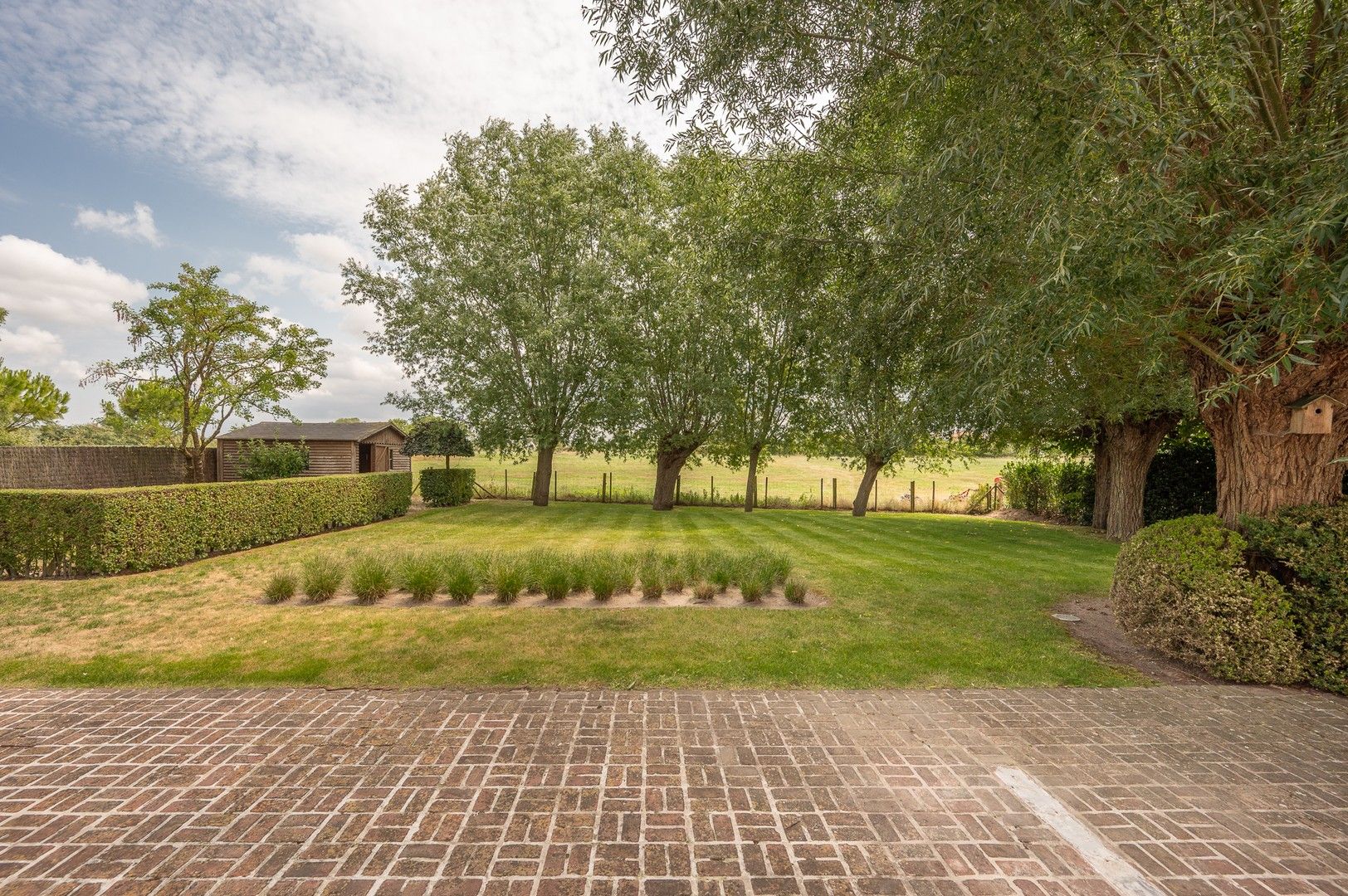 Alleenstaande villa genietend van prachtige open zichten op de polders. foto 17