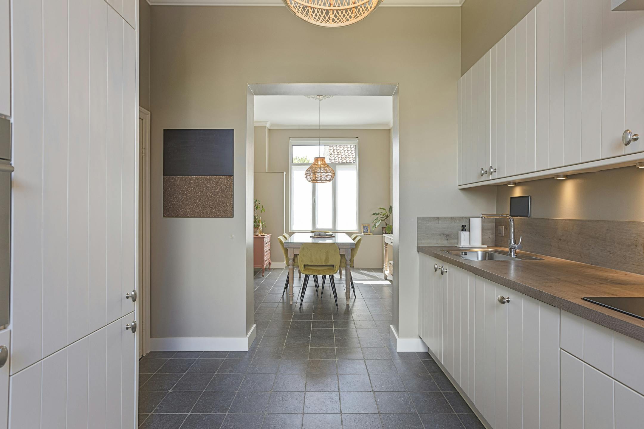 Gerenoveerde herenwoning met 3 slaapkamers en tuin. foto 21