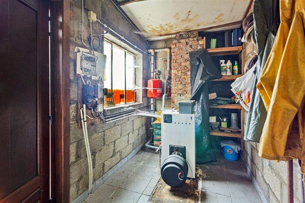 Te renoveren woning op een toplocatie foto 27