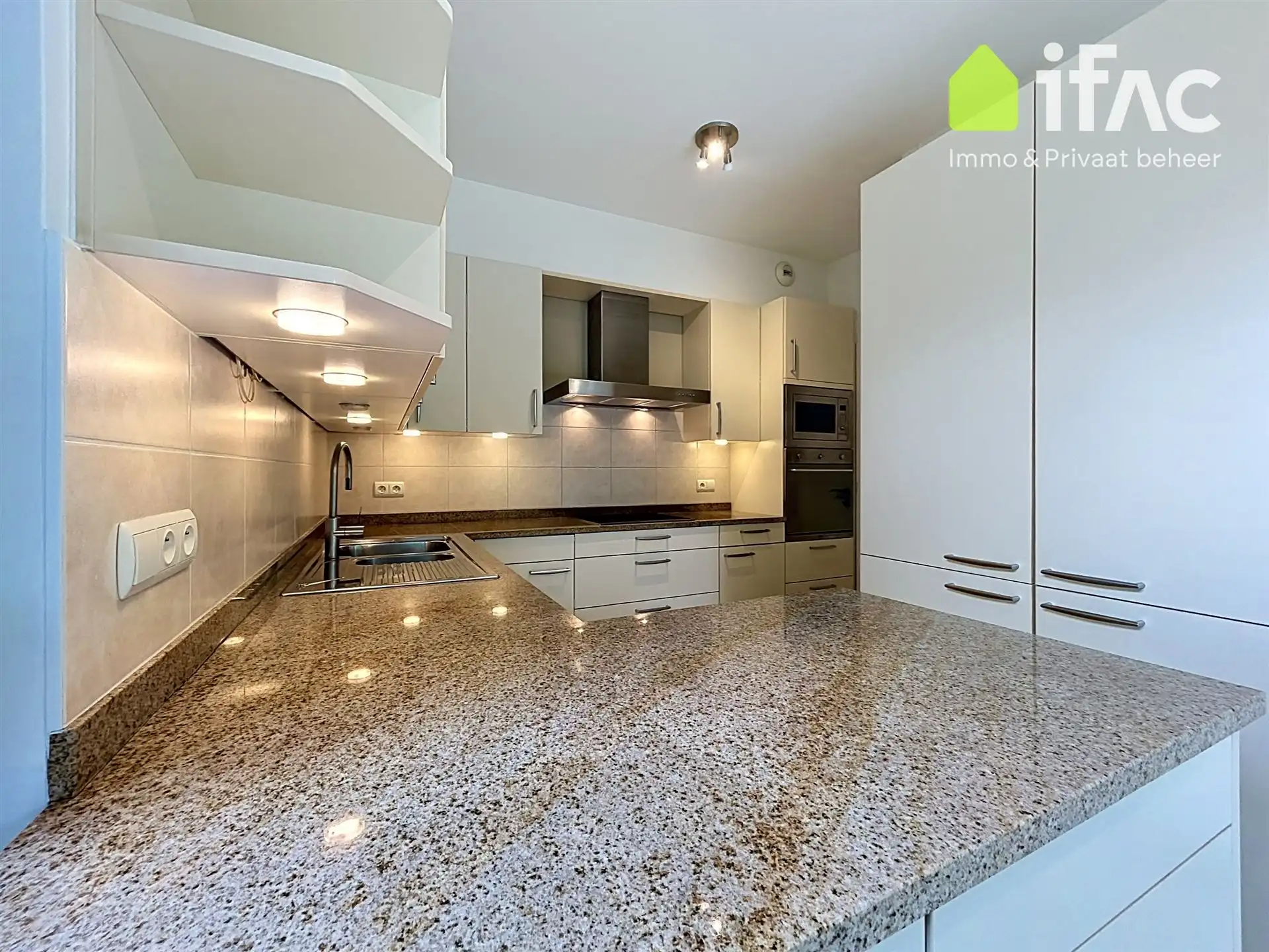 Exclusief gelijkvloers appartement met 2sk en privé tuin foto 10