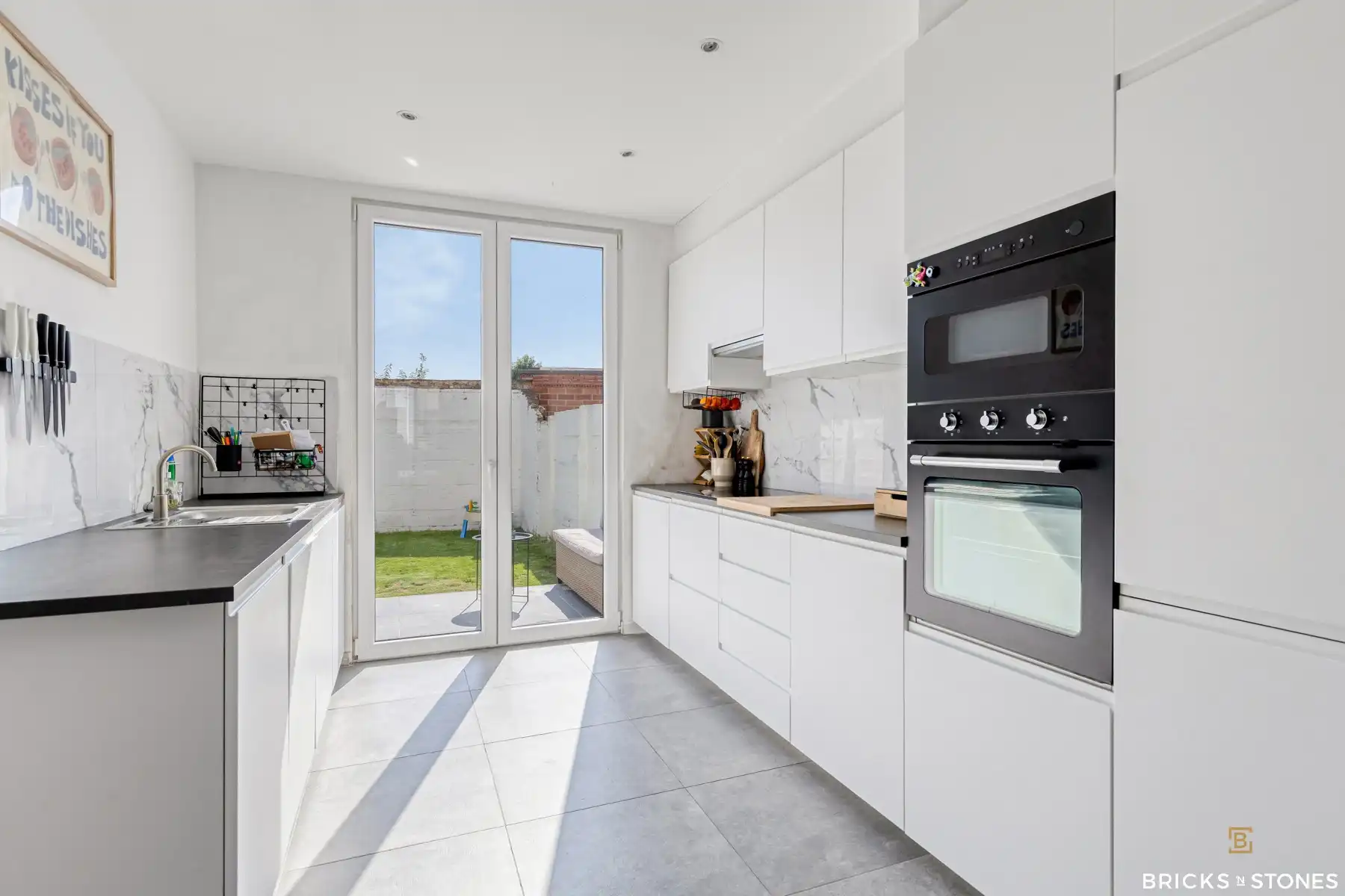 Leuke instapklare woning met 4 slpkms en tuin foto 8