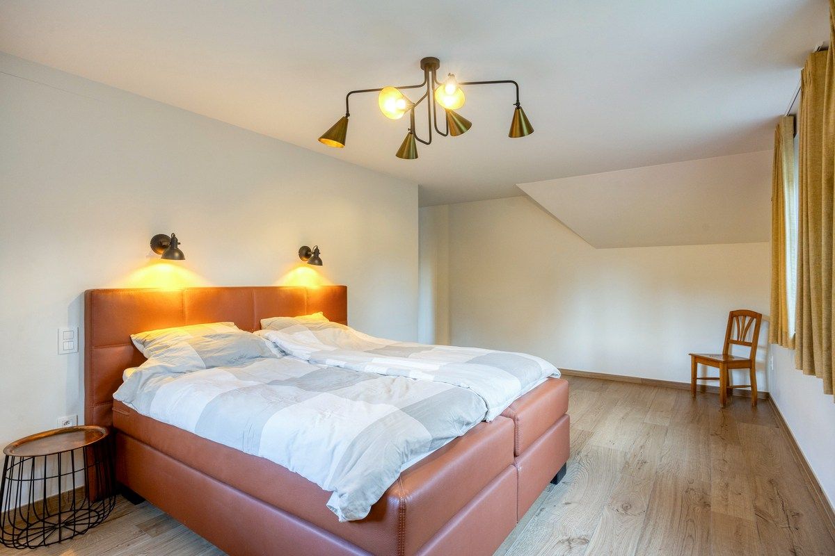 Ruim ingedeelde en kwalitatief afgewerkte villa op een mooi perceel met naastgelegen bouwgrond. foto 17