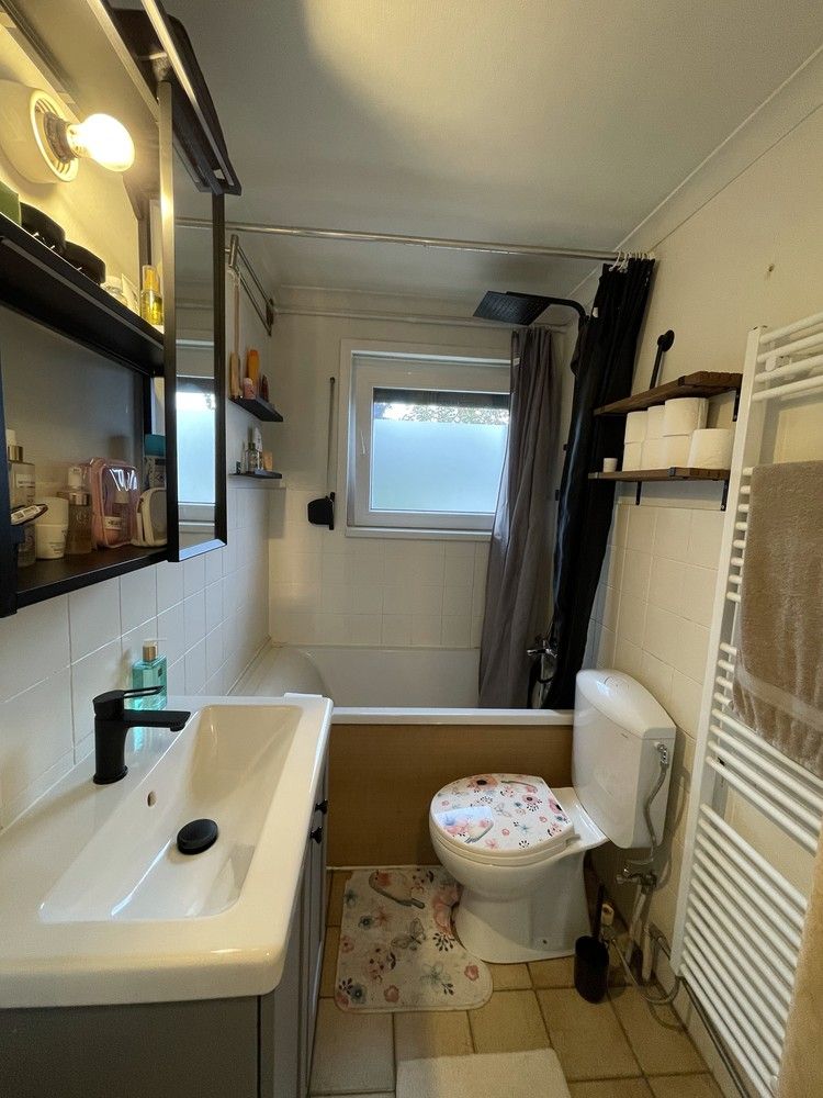 Knusse split-level woning op nagenoeg 27 are grond foto 7