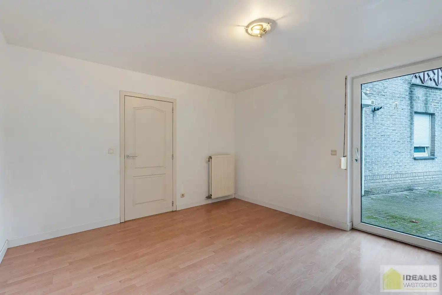 IDEALIS VASTGOED – INSTAPKLAAR GELIJKVLOERS APPARTEMENT MET LICHTRIJKE LEEFRUIMTE,  RUIME OPEN KEUKEN, BADKAMER, SLAAPKAMER EN AUTOSTAANPLAATS OP EEN GUNSTIGE LOCATIE NABIJ HET CENTRUM VAN PELT! foto 11