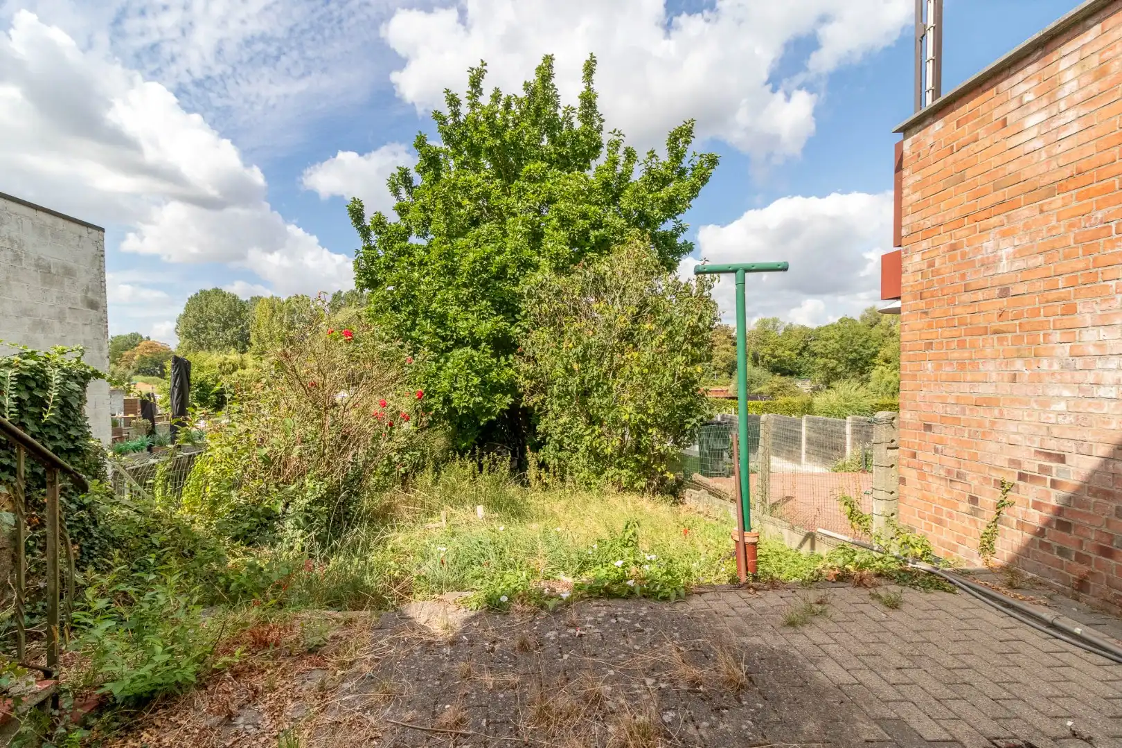 Stadswoning met 3 SLKS - 5 mogelijk en een grote tuin foto 24