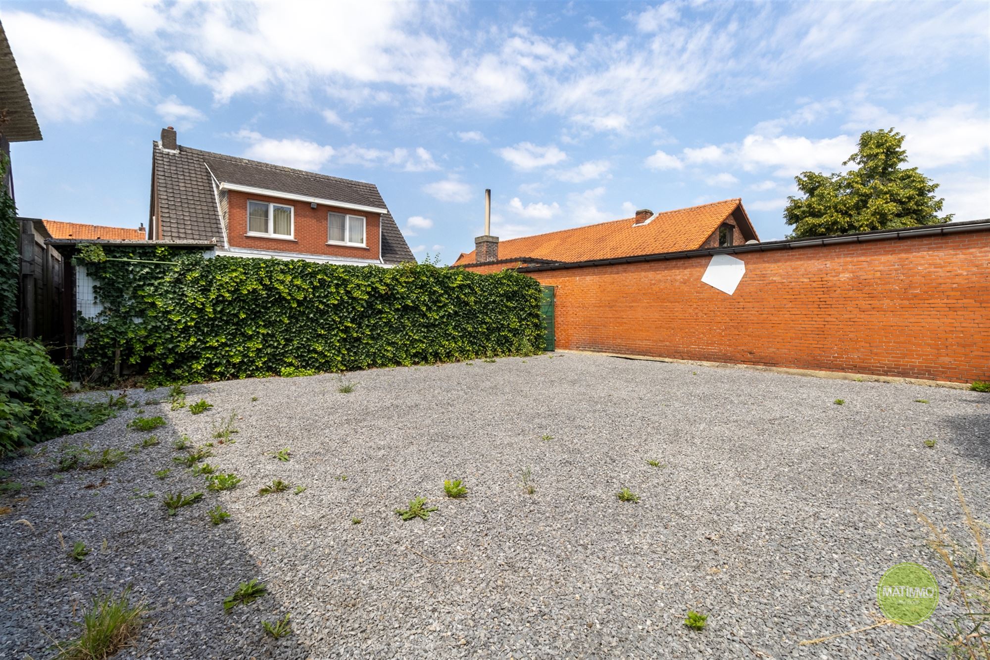 Te renoveren gezinswoning met werkhuis in Arendonk foto 2