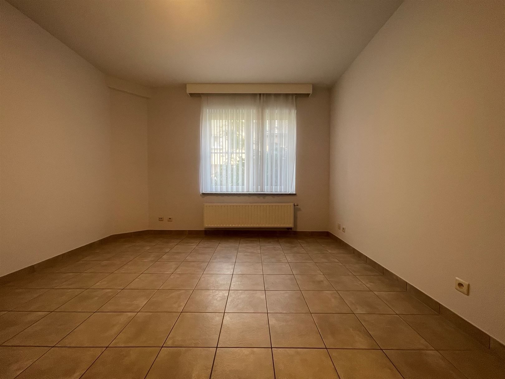 Gelijkvloerse appartement  met afgesloten koer  foto 12