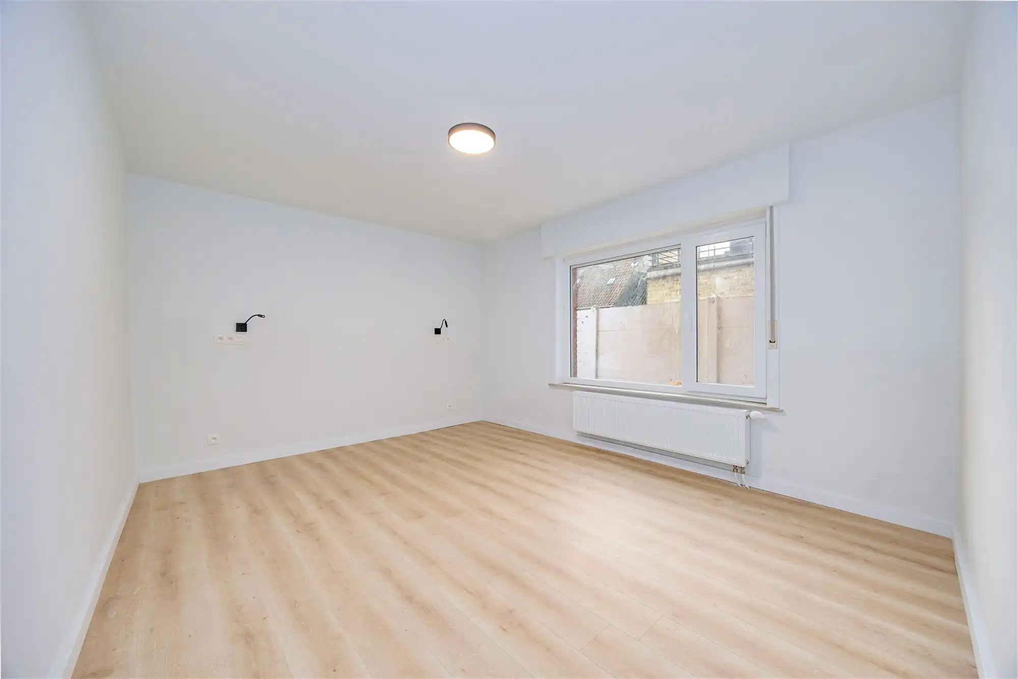 Gelijkvloers instapklaar appartement met tuin foto 9