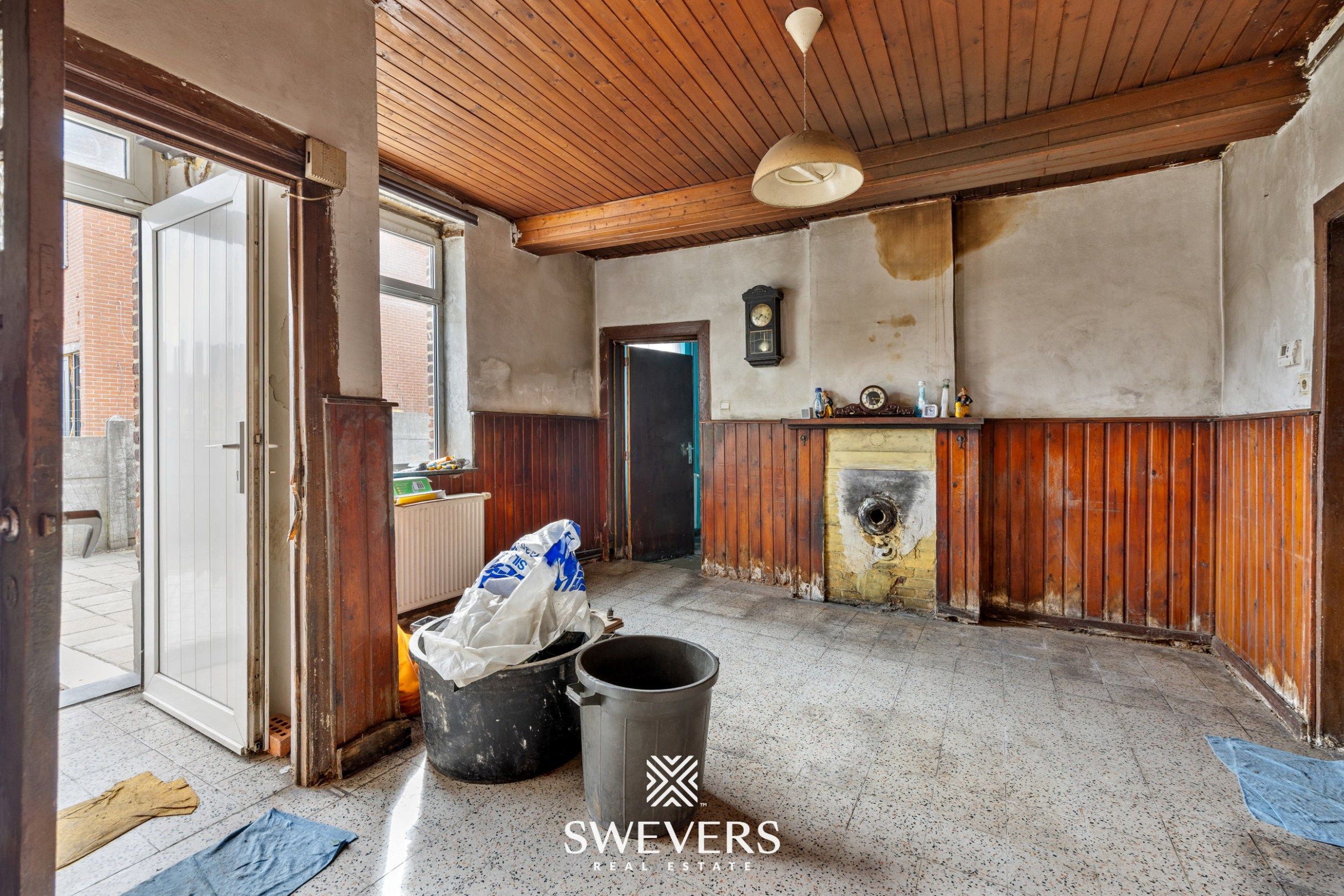 Te renoveren open bebouwing met groot perceel in rustige straat in Bilzen foto 4