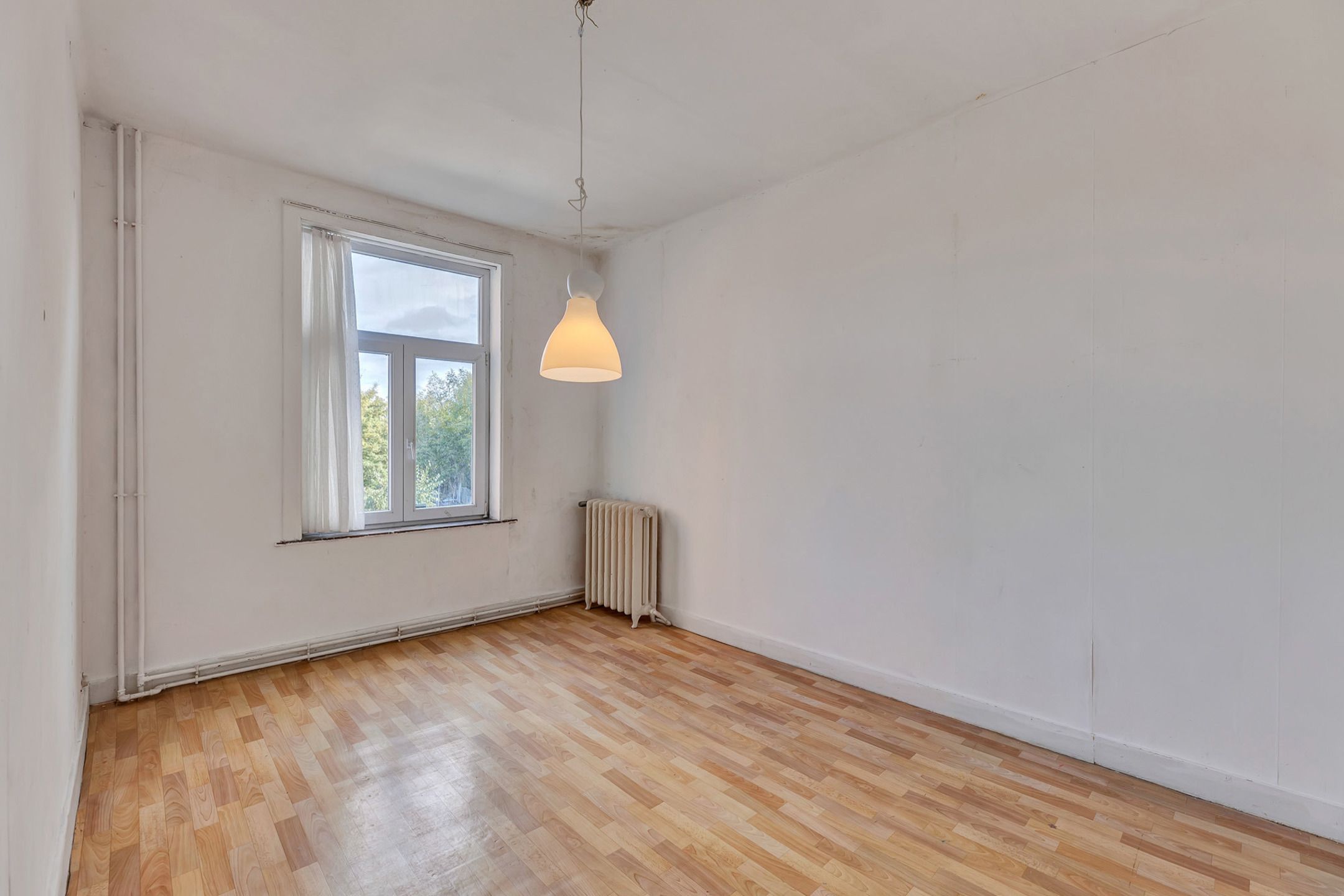 Op te frissen woning met tuin in Ternat! foto 13