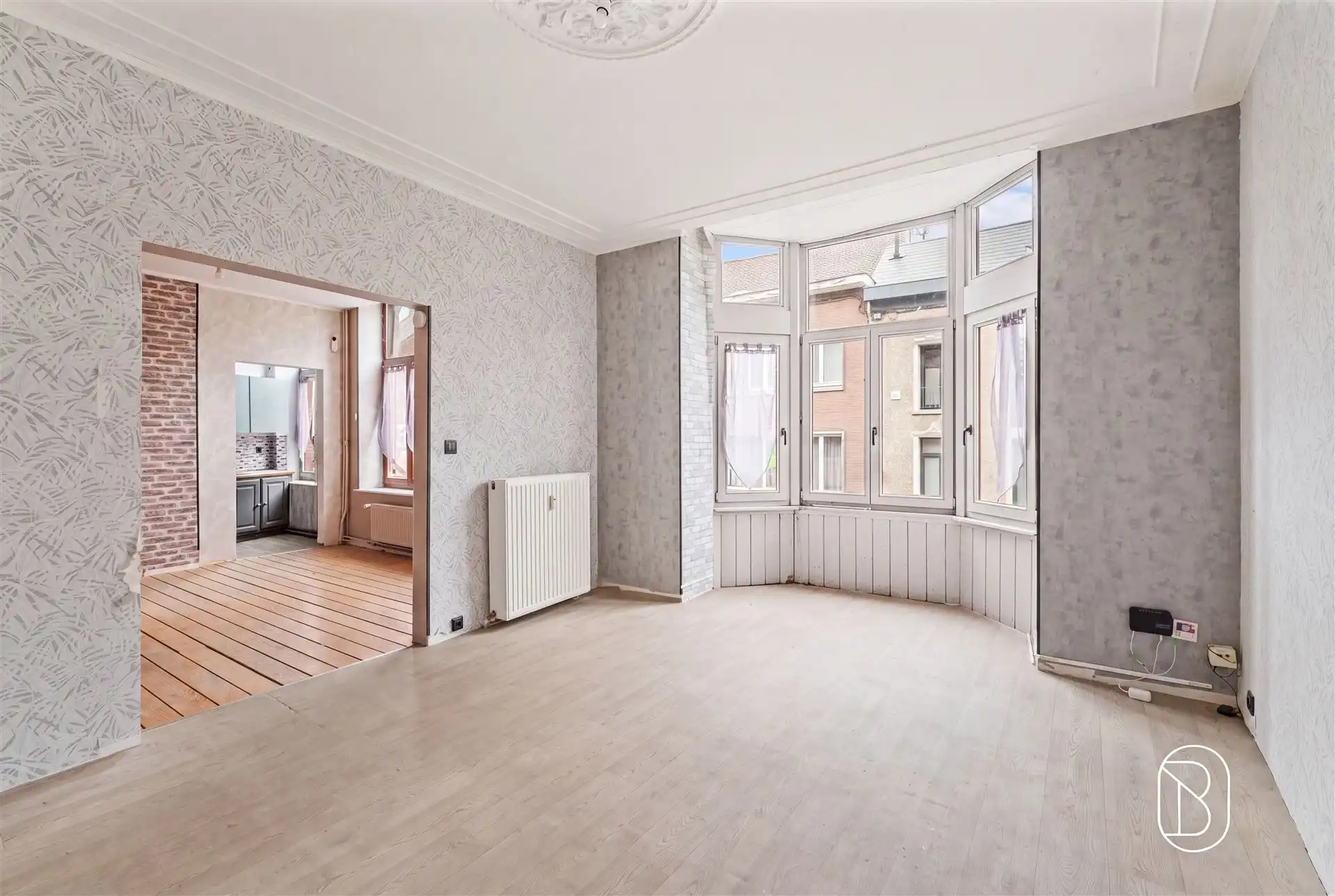 Opbrengsteigendom: handelsruimte en 2 appartementen foto 9