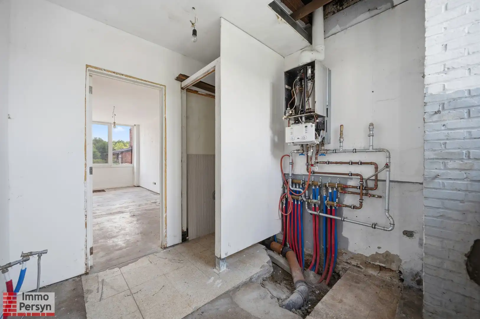 Ruime af te werken woning met nieuw dak, vernieuwde elektriciteit en diepe tuin  (EPC D) foto 10