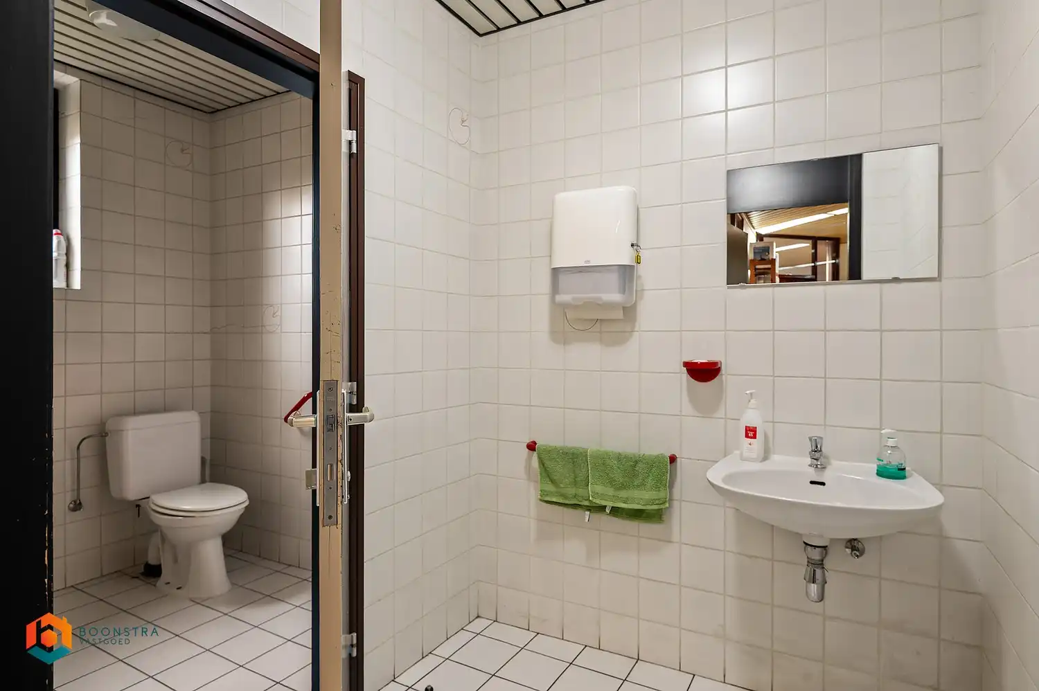 Veelzijdig handelspand met bouwgrond in centrum Rijmenam foto 11