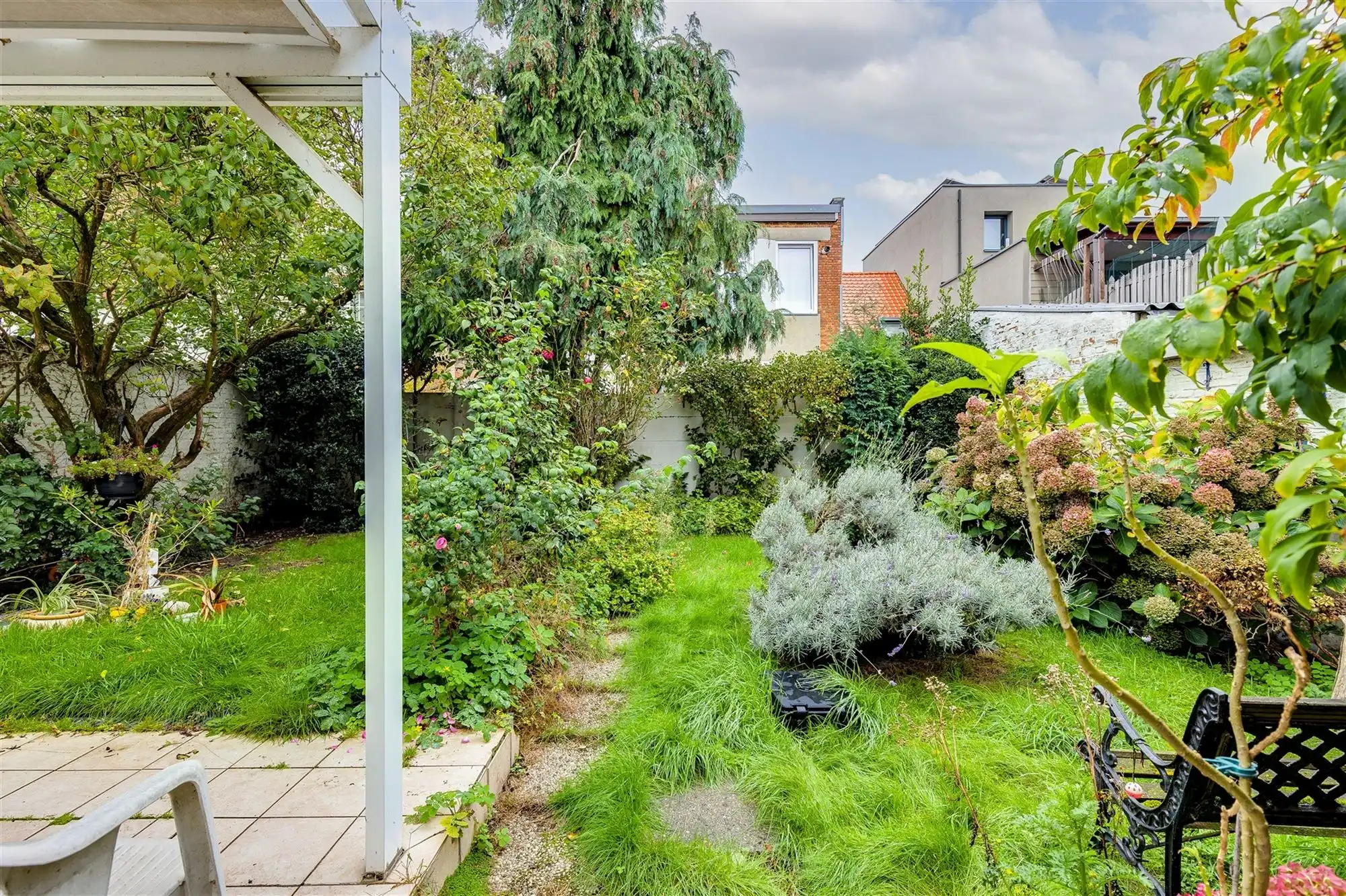 Te renoveren woning met tuin in Merksem foto 16