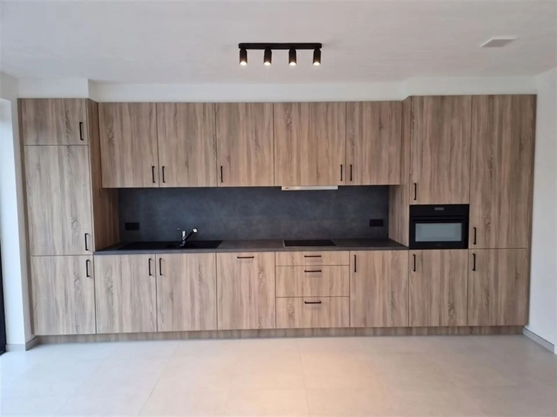 Gelijkvloers duplex appartement 132m², 2 slpk, terras + tuin 100m², garagebox foto 4